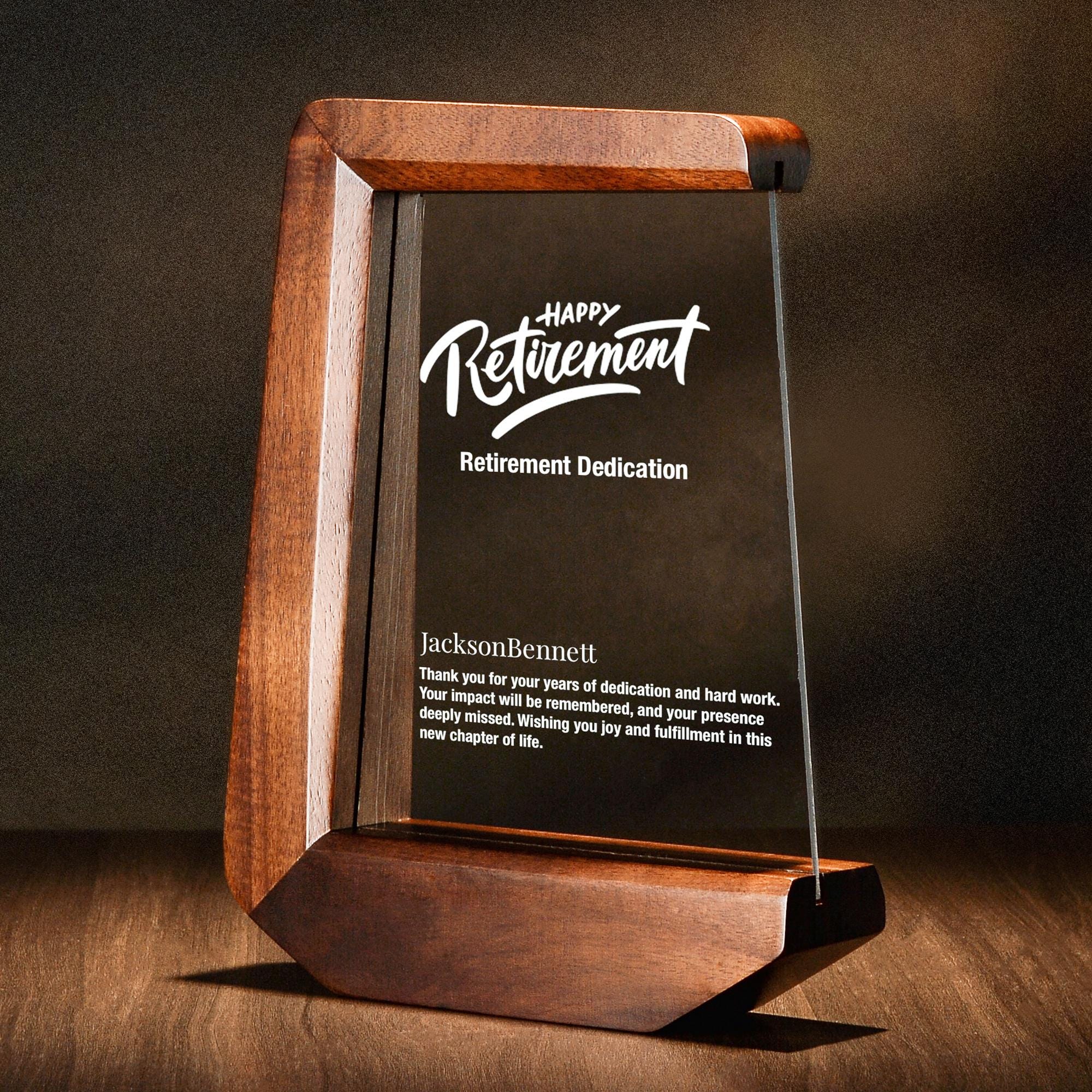 a wooden plaque with a happy retirement plaque on it