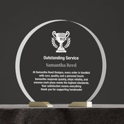 a plaque with a trophy on top of it
