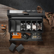 a black box with several watches inside of it
