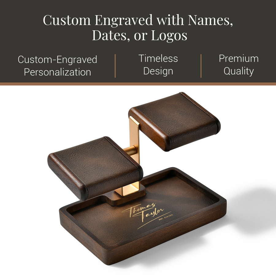 a wooden tray with a gold-colored metal stand, which appears to be a custom-engraved piece. The tray has a rectangular shape and is placed on a white background. The tray has a gold-colored metal stand with a gold-colored metal piece on it. The image does not contain any text, and the focus is on the tray and its design.