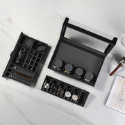 an assortment of watches and a pen on a table
