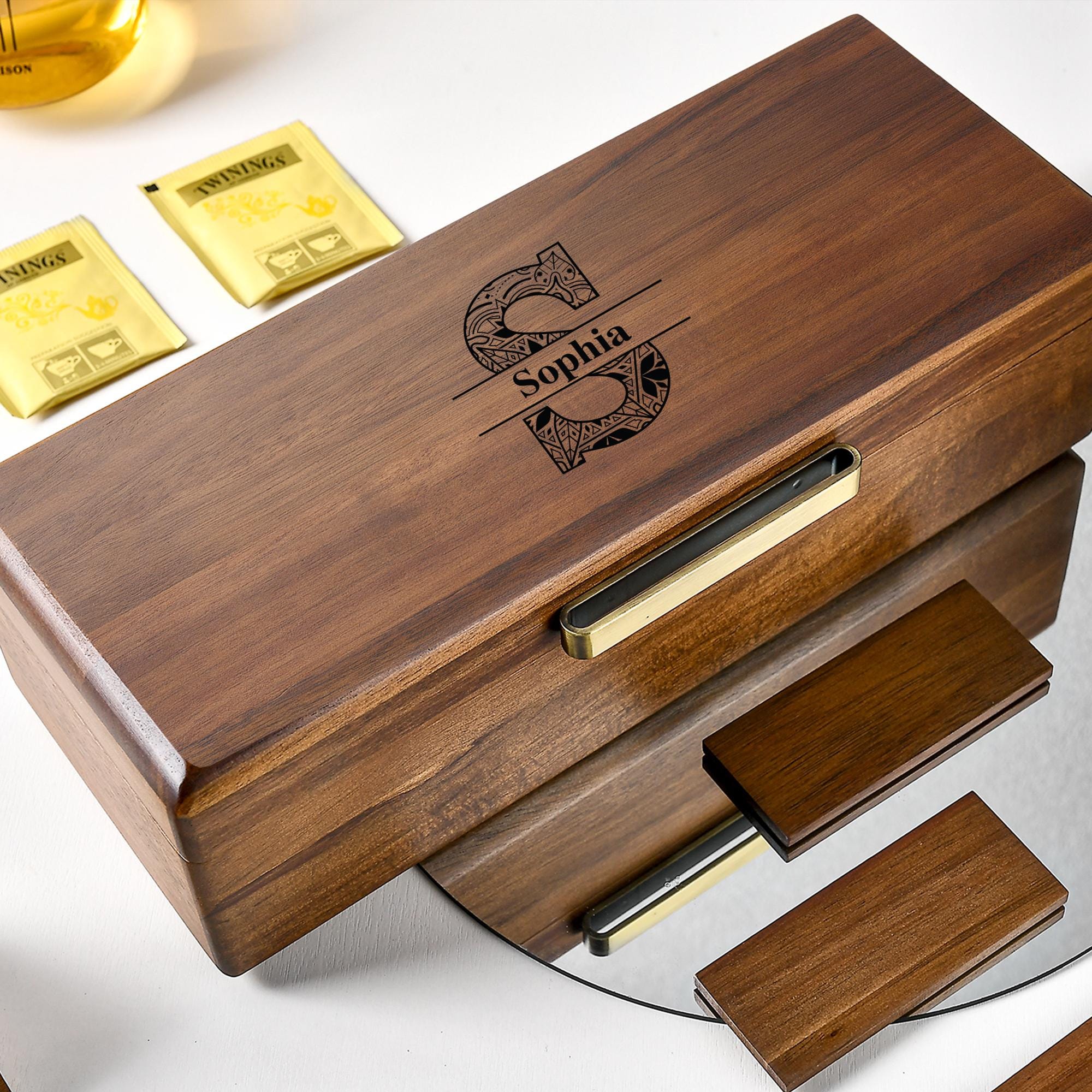 a wooden box that has some gold bars in it