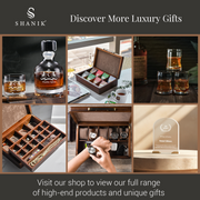 The image is a collage of six different images showcasing various luxury gifts and products, including a bottle of whiskey, a wooden box, a glass of whiskey, a wooden box with a watch, a glass of whiskey, and a glass of whiskey. The collage also includes a person's hands holding a watch and a person's hands holding a gift box. The image does not contain any text, and the focus is on the products and gifts displayed.
