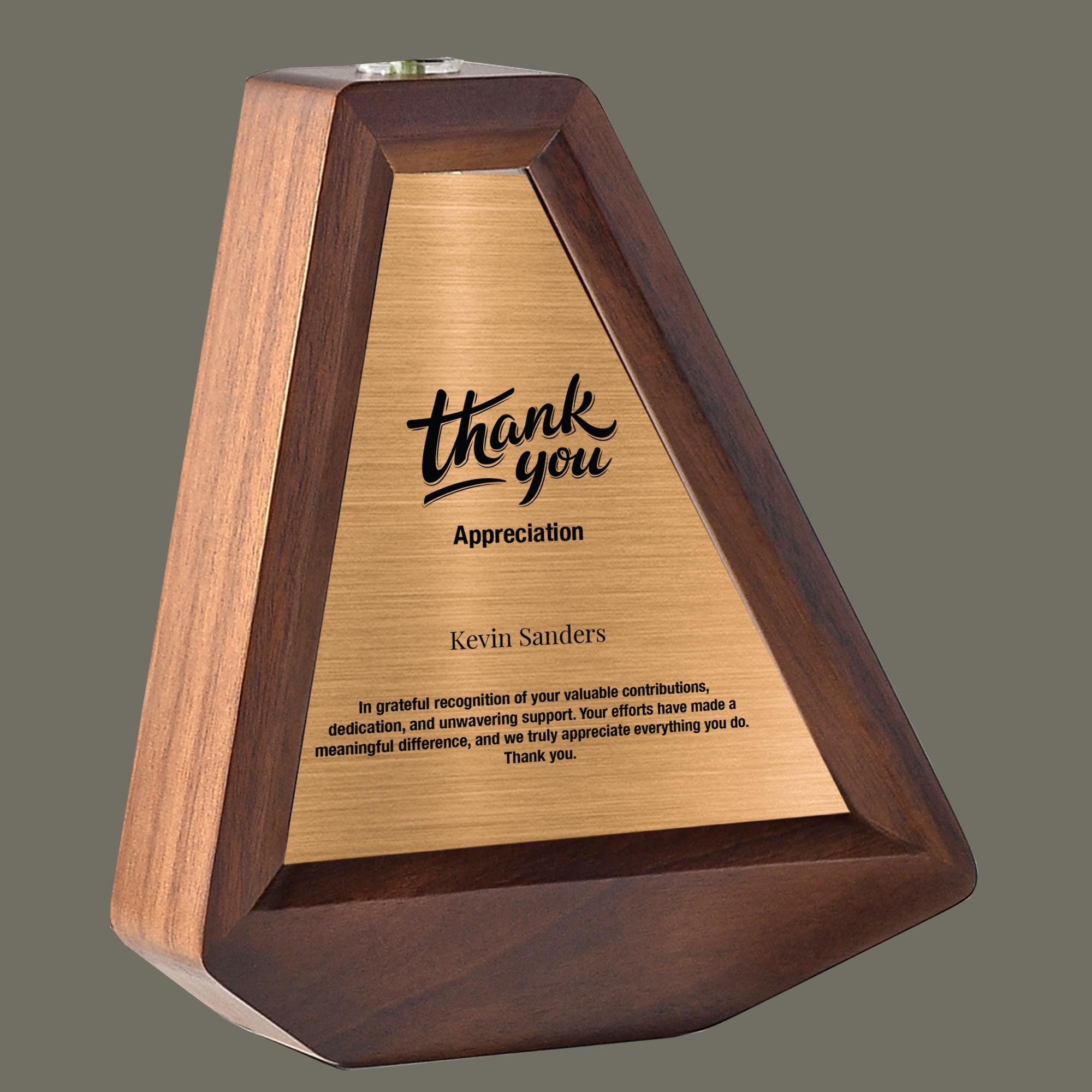 a wooden trophy with a thank you message on it