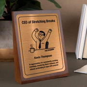 a wooden plaque with a picture of a man raising his fist