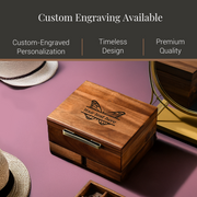 a wooden box with a butterfly design, placed on a pink surface. The box has a handle on the front and appears to be a custom-engraved wooden box.