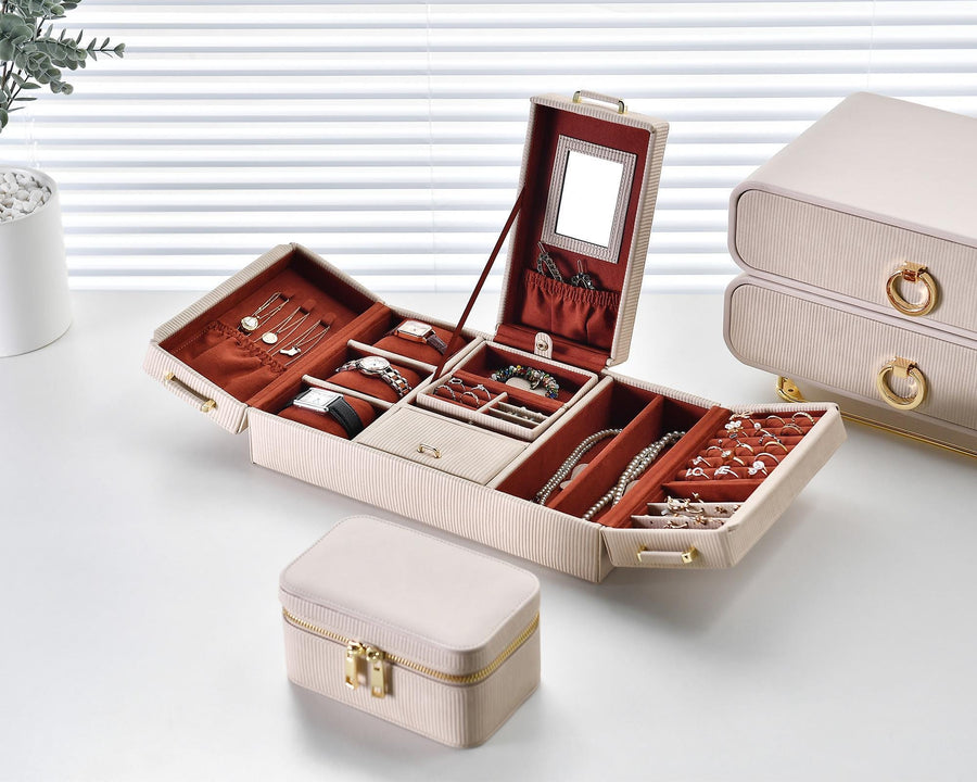 a white box with jewelry inside of it