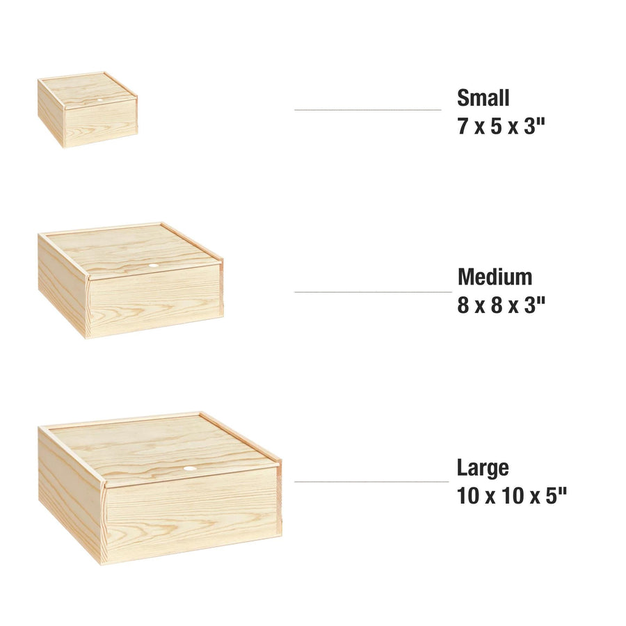 three different sizes of wooden boxes, ranging from small to large.