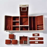 a wooden box with several pieces of furniture inside of it