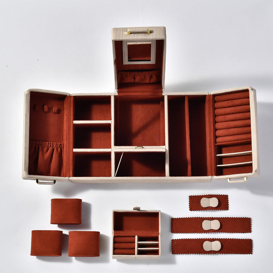 a wooden box with several pieces of furniture inside of it