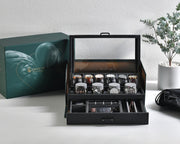 a box of watches sitting on a table next to a box of watches