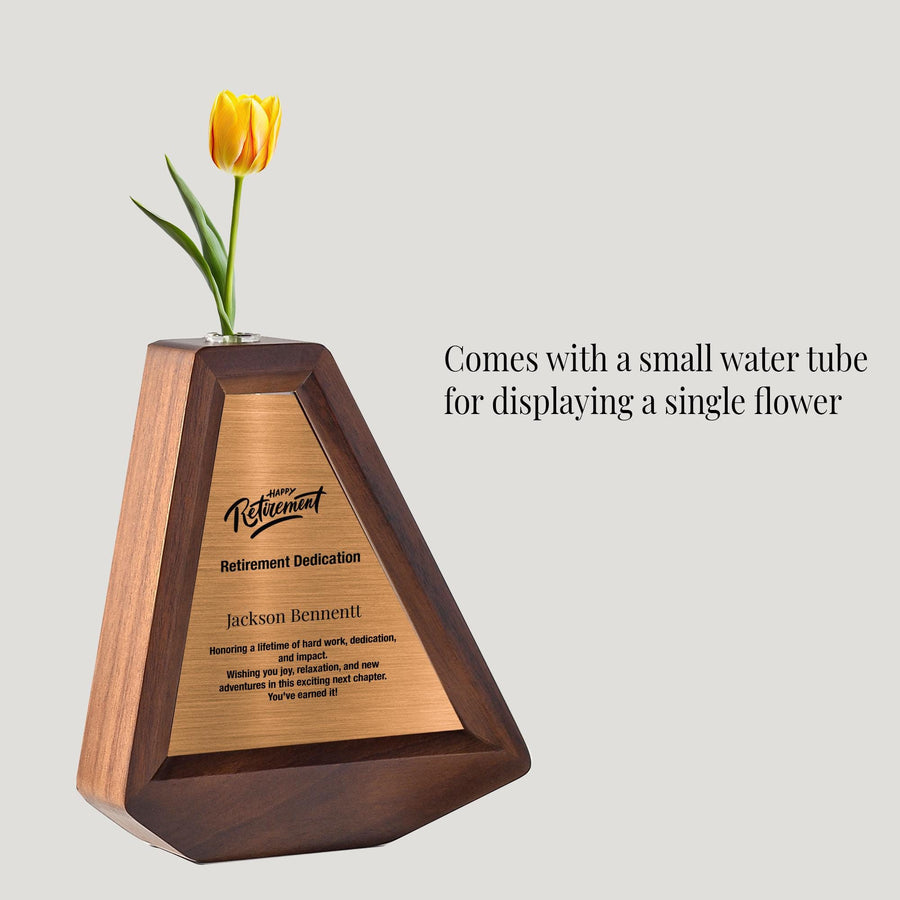 a wooden vase with a single flower in it