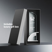 a black and white photo of an award in a box