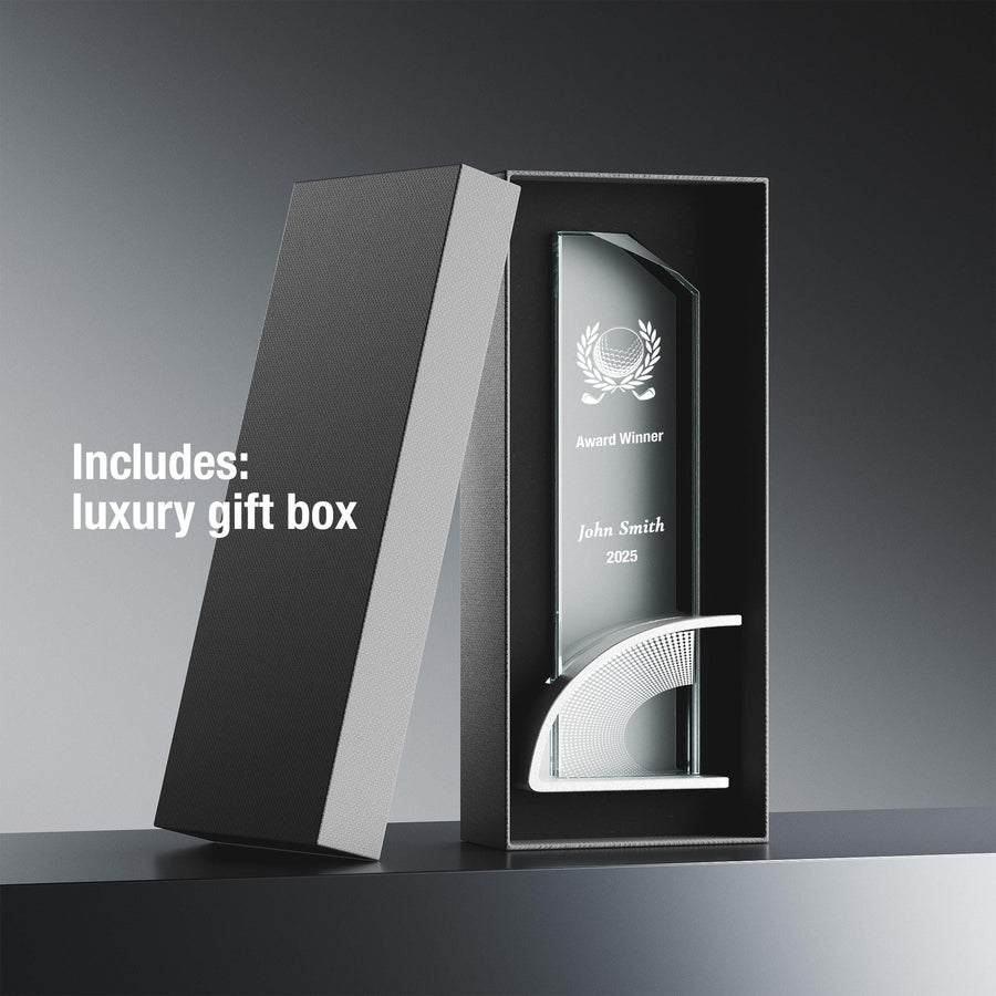 a black and white photo of an award in a box