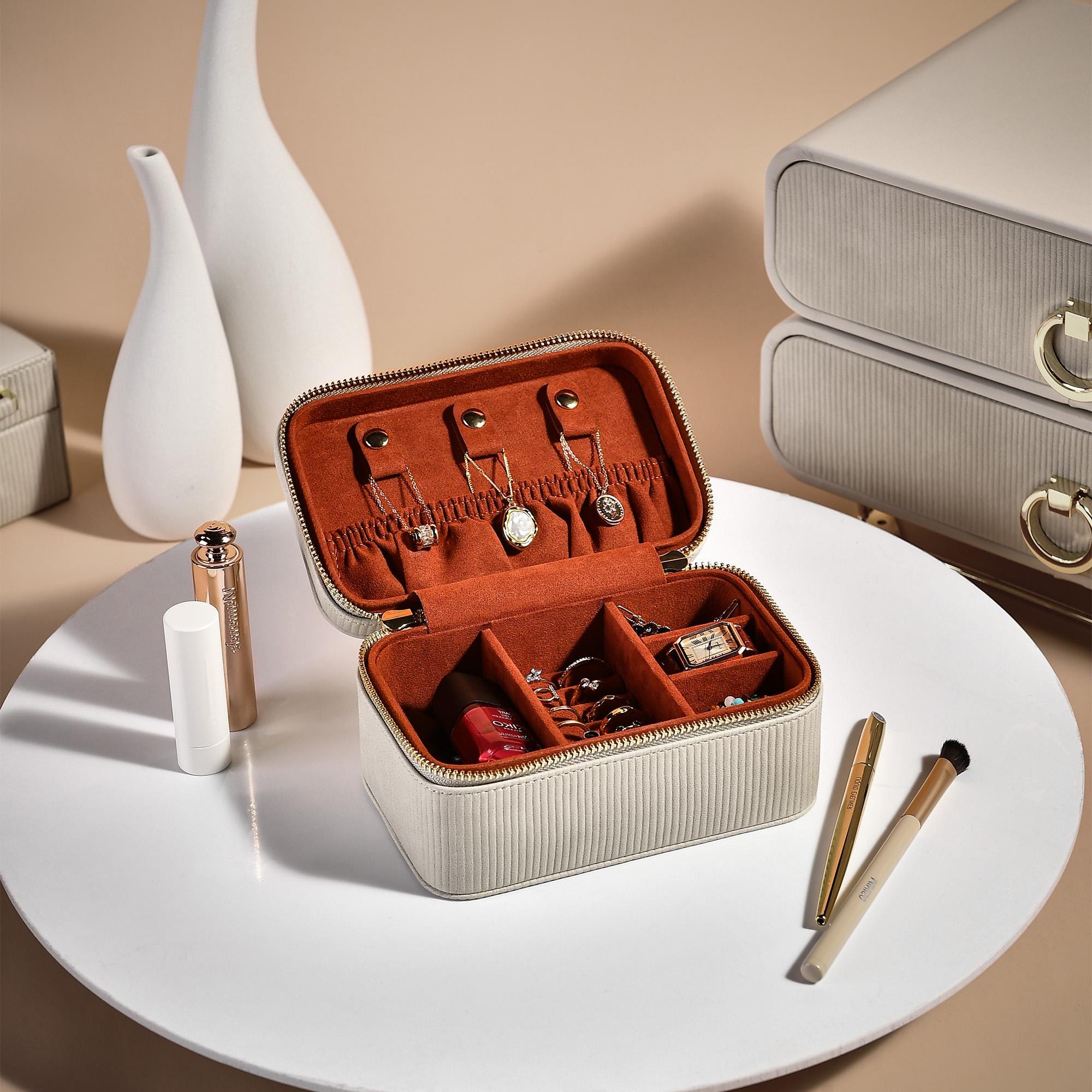 an open suitcase sitting on top of a white table