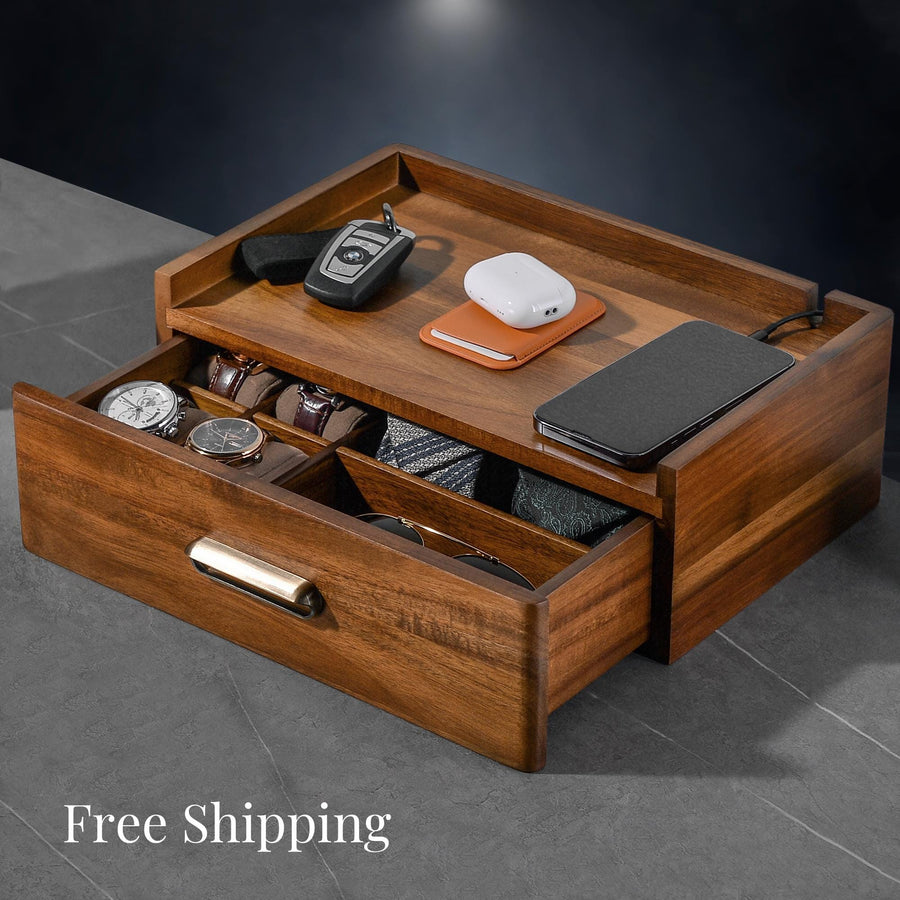 a wooden desk with a drawer and a phone