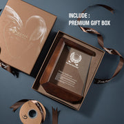a gift box with a ribbon and ribbon around it