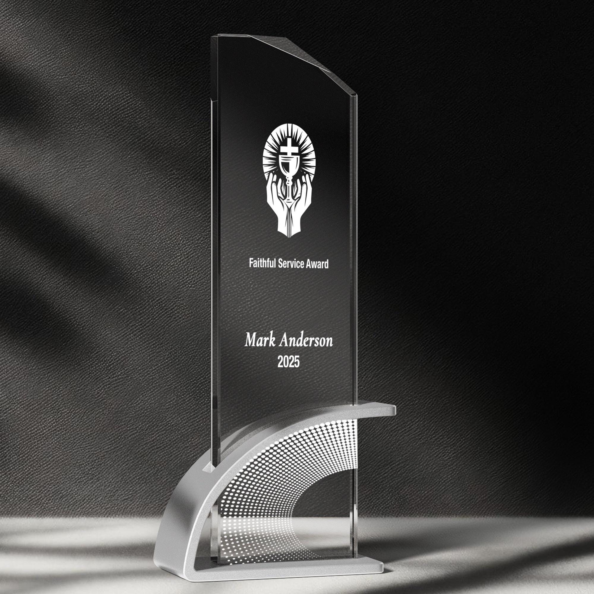 a glass award with a black background
