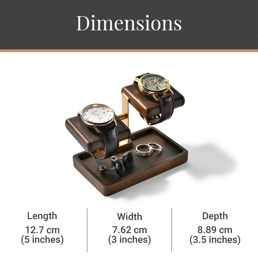 A wooden watch stand with two watches on it, along with some rings and a pen holder.