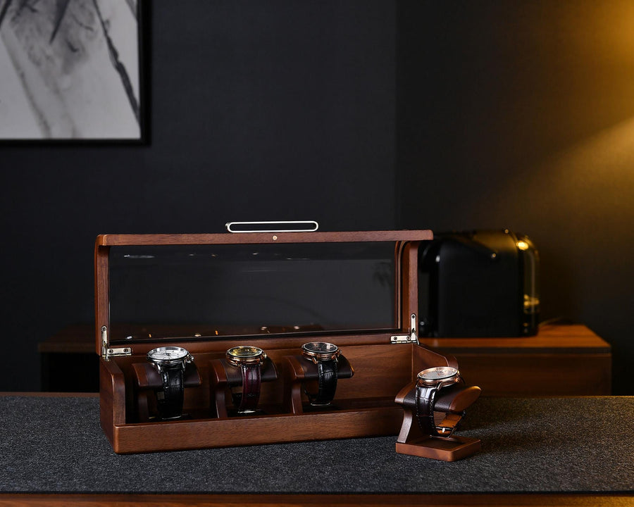 a wooden box with six watches inside of it