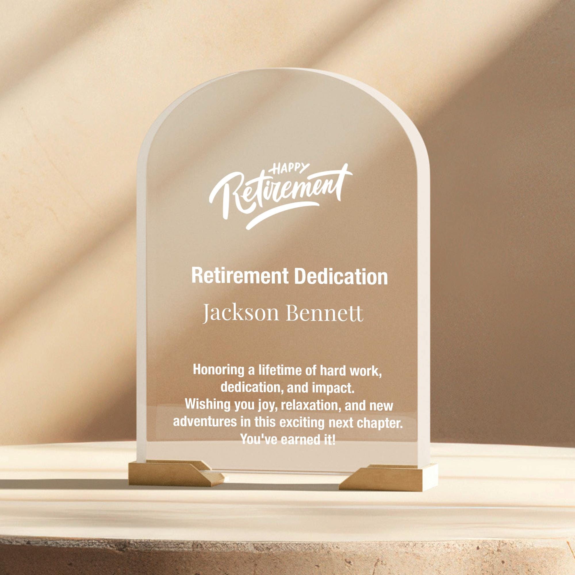 a clear glass award plaque sitting on top of a table