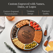 a wooden platter with an assortment of snacks, including crackers, cheese, fruit, and cookies, arranged on a marble surface.