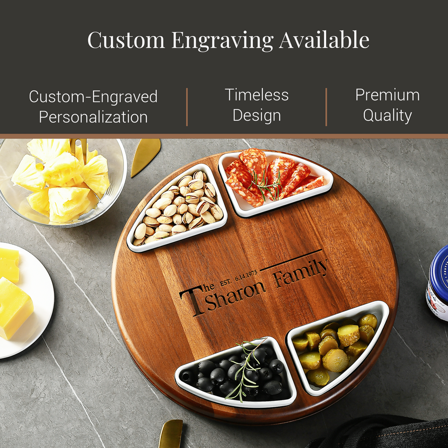 a wooden serving board with four separate compartments, each containing a different type of food, such as cheese, olives, nuts, and fruit. The board is accompanied by a bowl of sliced pineapple and a small container of butter. The image also includes text that reads "Custom Engraving Available" and "Premium Quality", suggesting that the board can be personalized with a custom engraving.