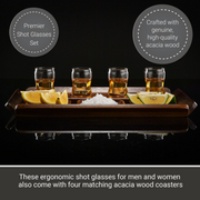 a set of four shot glasses, each with a matching acacia wood coaster, arranged on a wooden tray. The shot glasses are labeled as "Premier Shot Glasses Set" and "Crafted with genuine, high-quality acacia wood".