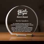 a glass plaque with a thank message on it