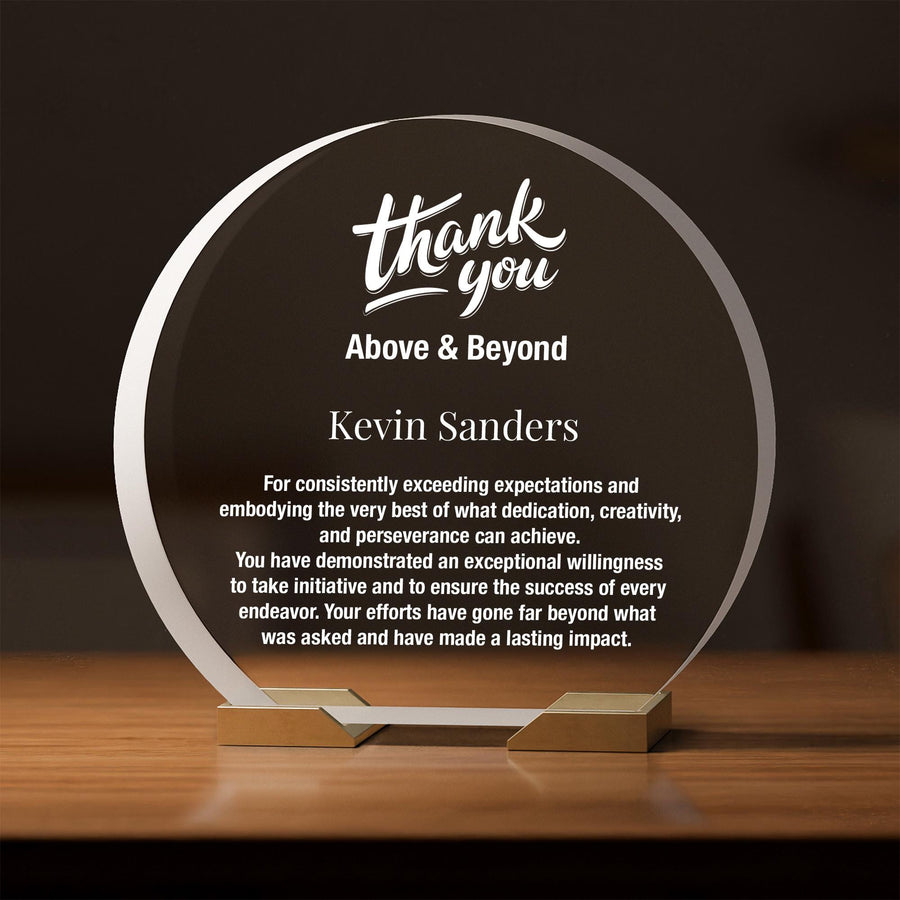 a glass plaque with a thank message on it