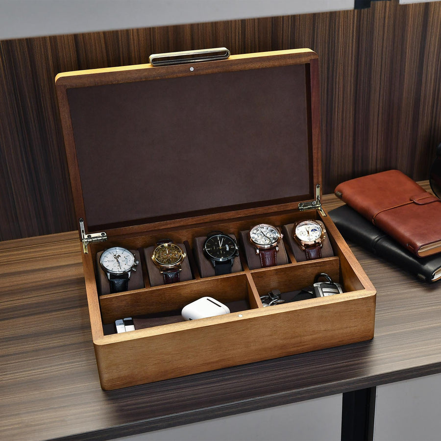a wooden box with a bunch of watches inside of it