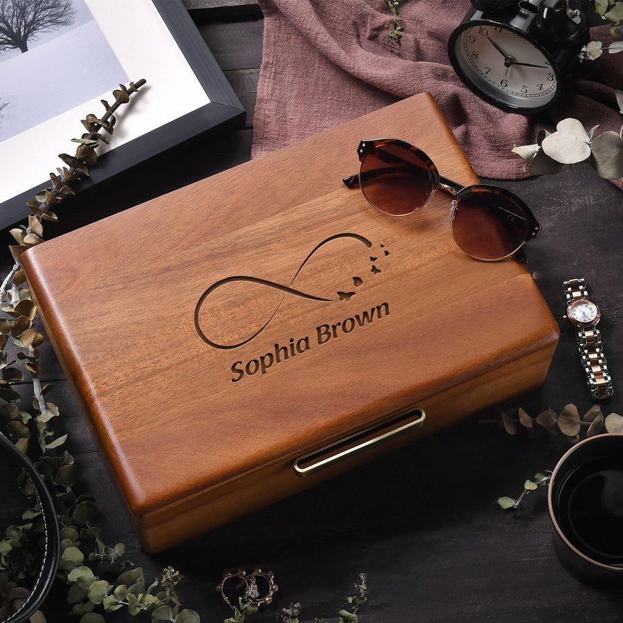 a wooden box with a pair of sunglasses on top of it