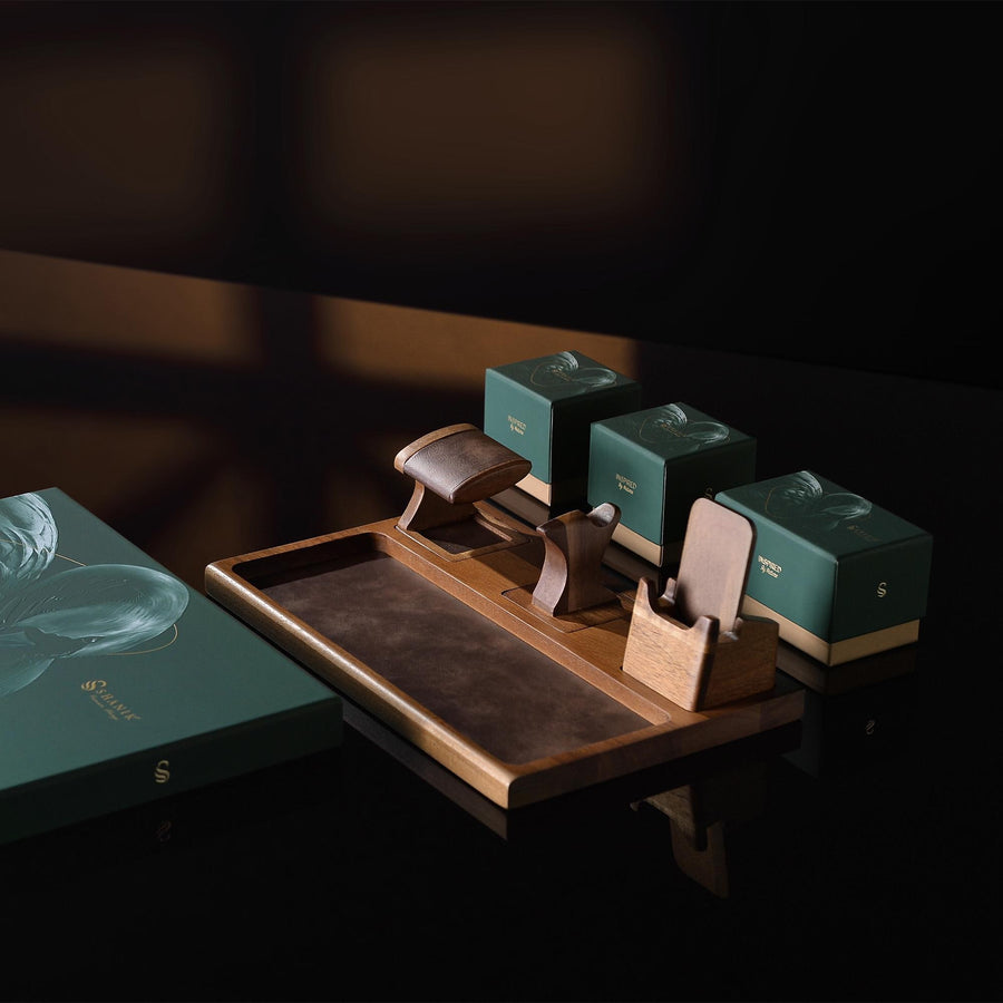 a table with a book and a pair of scissors on it