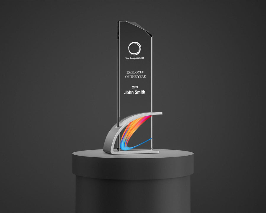 Employee of the Year award for John Smith, 2024, features a modern design with a clear optic crystal plaque and a vibrant ribbon pattern base. The award displays the company logo at the top, set against a dark background.