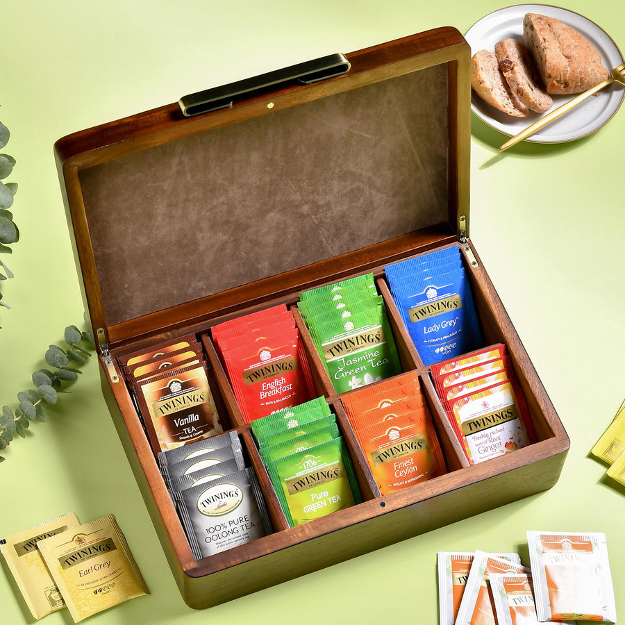a wooden box filled with different types of coffee