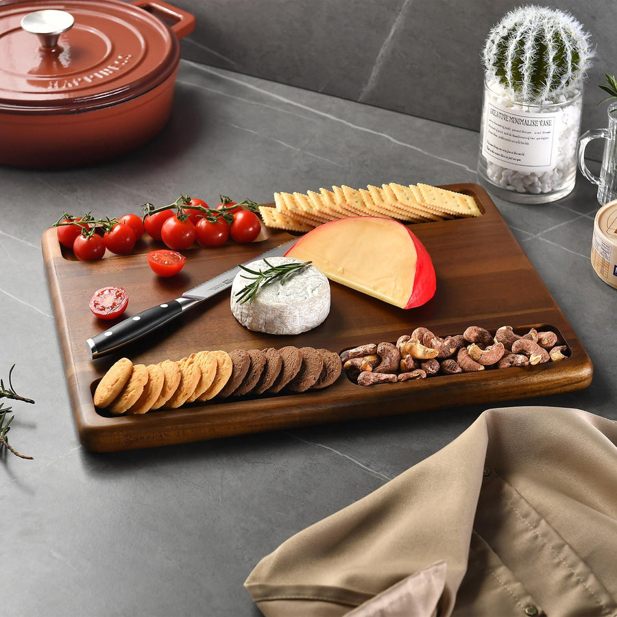 a wooden cutting board topped with cheese and crackers