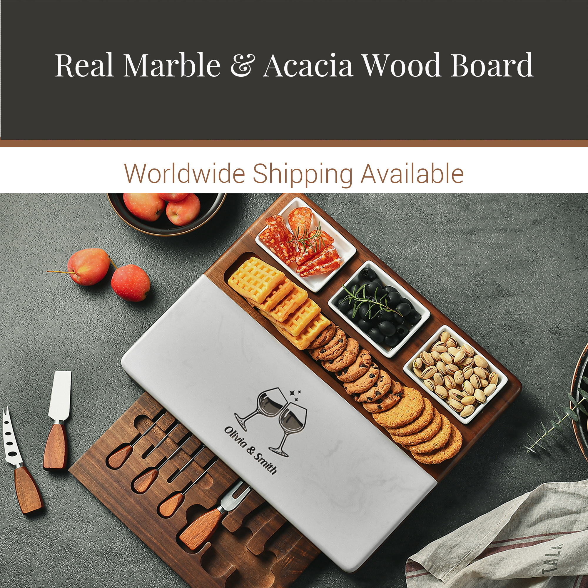 a marble and acacia wood board with various food items, including crackers, nuts, and fruit, arranged on it. The board is accompanied by a set of knives and a bowl of fruit. The image also includes text that reads "Real Marble & Acacia Wood Board Worldwide Shipping Available".