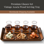 A set of four vintage acacia wood serving trays, each containing a different type of food or drink, arranged on a wooden tray.
