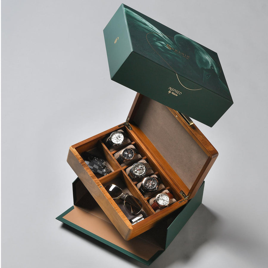 a green box with several watches inside of it
