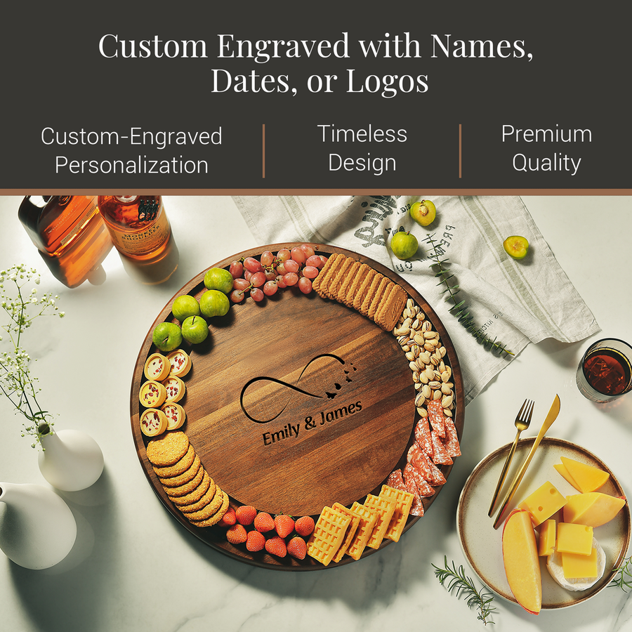 a wooden platter with an engraved design, surrounded by various food items such as crackers, cheese, grapes, and apples. There are also two bottles and a vase on the table. The image includes text that describes the custom engraving options available, such as names, dates, or logos, and highlights the premium quality of the engraving service.