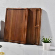 a wooden cutting board sitting on top of a counter