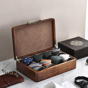 a suit case filled with ties and ties