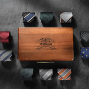 a wooden box filled with different types of ties