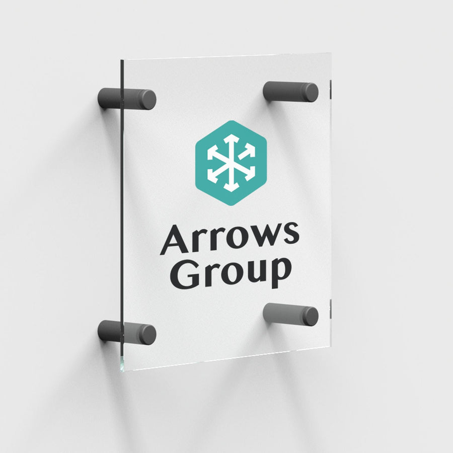 a sign for the Arrows Group, which is a company that specializes in snow removal equipment.