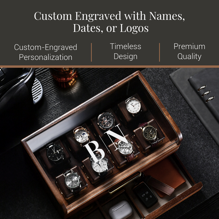 A wooden watch case with multiple watch faces visible inside, along with a black leather-bound notebook and a glass of wine.
