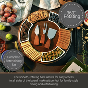A wooden serving platter with various snacks and crackers, including grapes, olives, and cheese, arranged in a circular pattern. The platter also includes a set of three wooden serving utensils, including a knife, a fork, and a spoon. The image also includes text that describes the platter as a "Complete Entertaining Set" and a "360° Rotating Platter", suggesting that it is a versatile and convenient serving piece for family-style dining and entertaining.