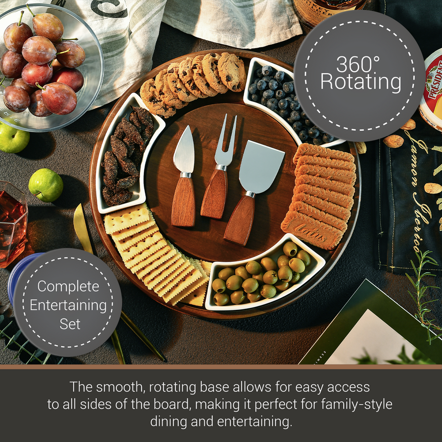 A wooden serving platter with various snacks and crackers, including grapes, olives, and cheese, arranged in a circular pattern. The platter also includes a set of three wooden serving utensils, including a knife, a fork, and a spoon. The image also includes text that describes the platter as a "Complete Entertaining Set" and a "360° Rotating Platter", suggesting that it is a versatile and convenient serving piece for family-style dining and entertaining.