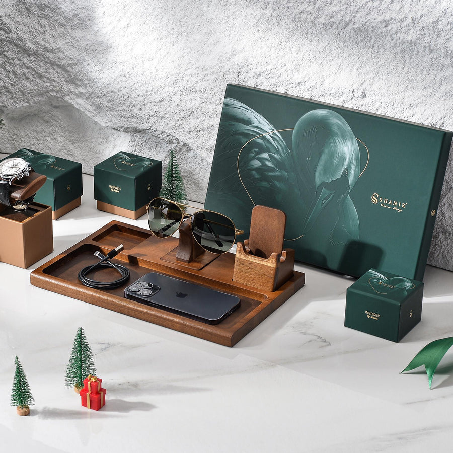 a wooden tray with a watch and other items